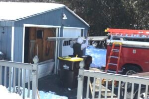 man performing garage door replacement