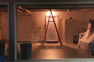 garage at night with light and ladder