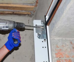 how to repair garage door spring